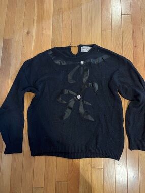 Vintage knit black sweater with bows and beaded details